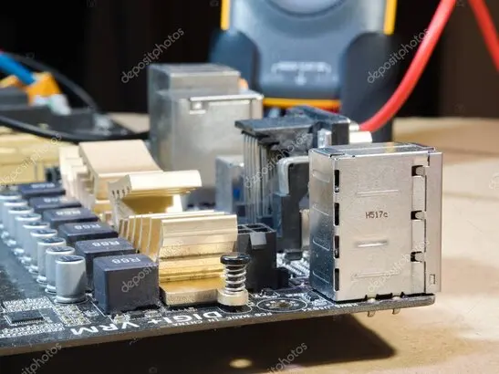 Technician testing a faulty power supply unit on a workbench